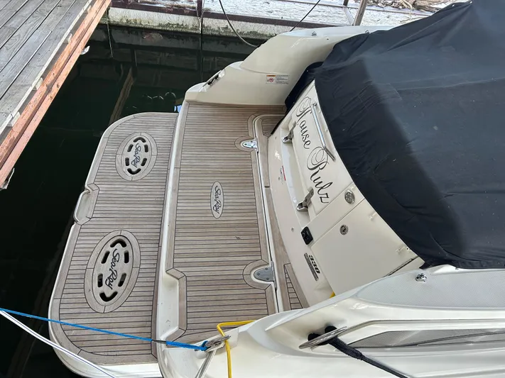  Yacht Photos Pics 2016 Sea Ray 330 Sundancer docked, featuring teak swim platform and covered seating area.