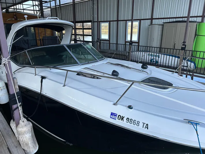  Yacht Photos Pics 2016 Sea Ray 330 Sundancer docked in a covered marina.