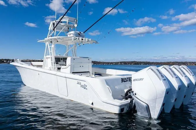  Yacht Photos Pics 2016 SeaVee 390Z boat with four Mercury engines on a sunny day.