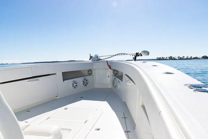  Yacht Photos Pics 2016 SeaVee 390Z boat deck with speakers, clear sky, and calm water.