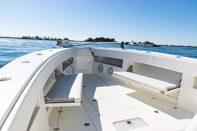  Yacht Photos Pics 2016 SeaVee 390Z boat interior with seating, on calm blue water.