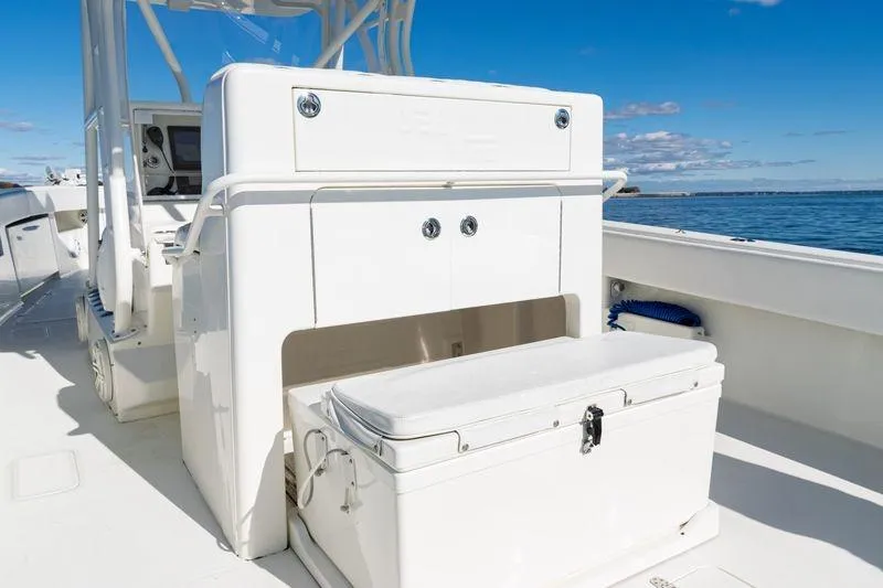  Yacht Photos Pics 2016 SeaVee 390Z boat interior with storage and seating, under clear blue sky.