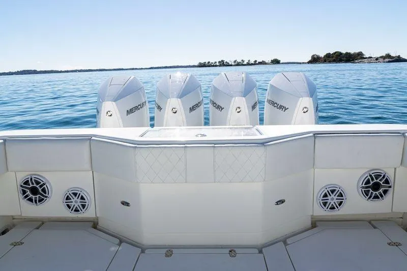  Yacht Photos Pics 2016 SeaVee 390Z boat with four Mercury engines on calm water.