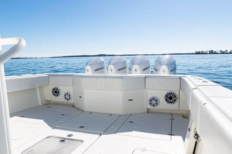  Yacht Photos Pics 2016 SeaVee 390Z boat with four Mercury engines on calm water.
