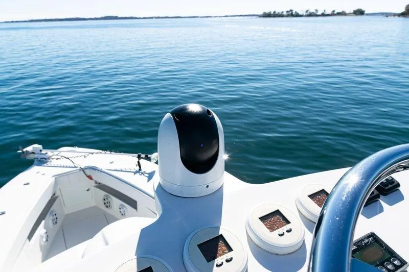  Yacht Photos Pics 2016 SeaVee 390Z boat dashboard with ocean view and navigation equipment.