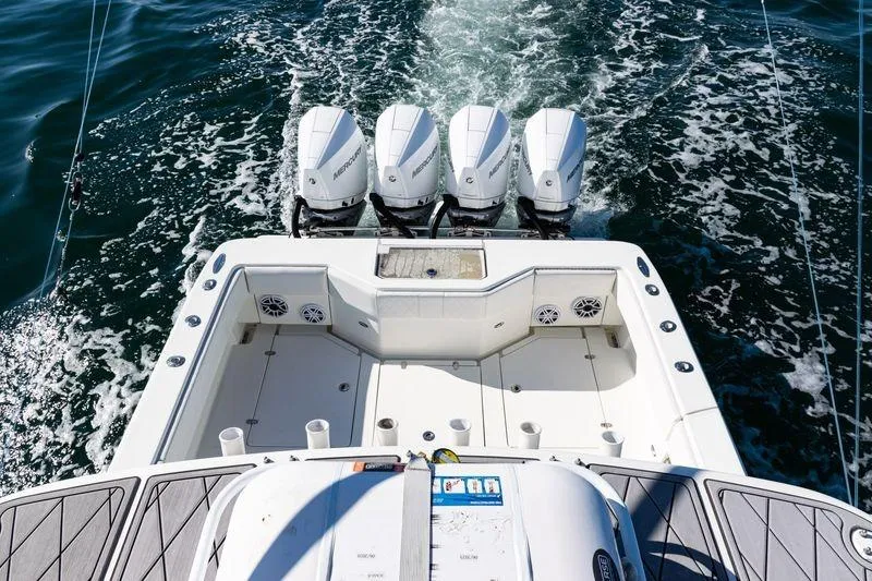  Yacht Photos Pics 2016 SeaVee 390Z boat with four Mercury outboard engines on open water.