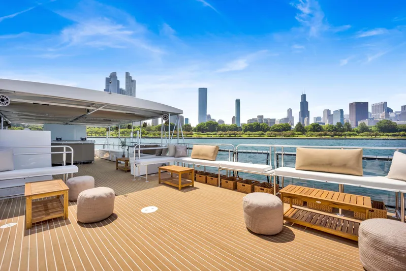  Yacht Photos Pics Luxurious A&M Manufacturing COI 2026 yacht deck with city skyline view.