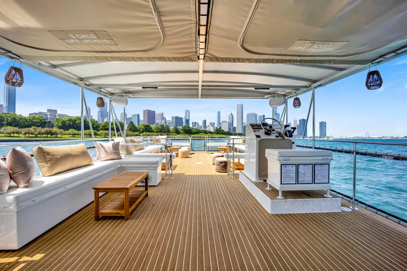  Yacht Photos Pics Luxurious 2026 A&M Manufacturing COI yacht deck with city skyline view.