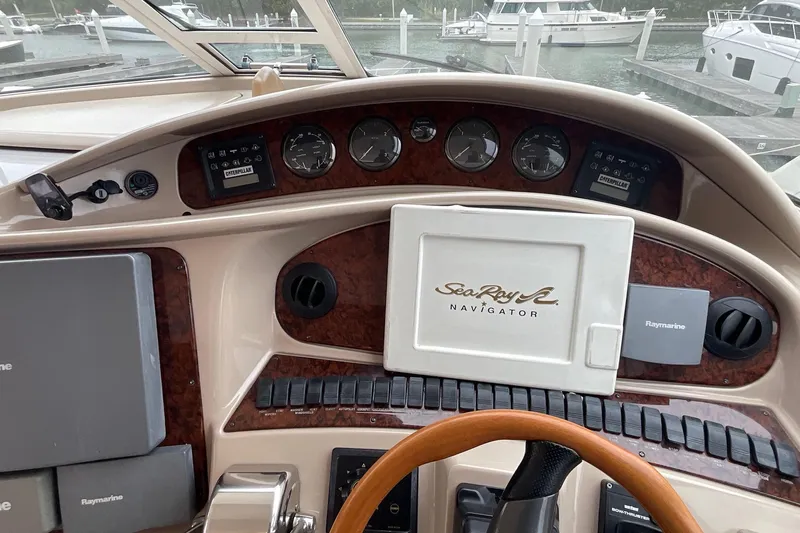 Club Level Yacht Photos Pics Dashboard of a 2002 Sea Ray 480 Motor Yacht with navigation equipment.