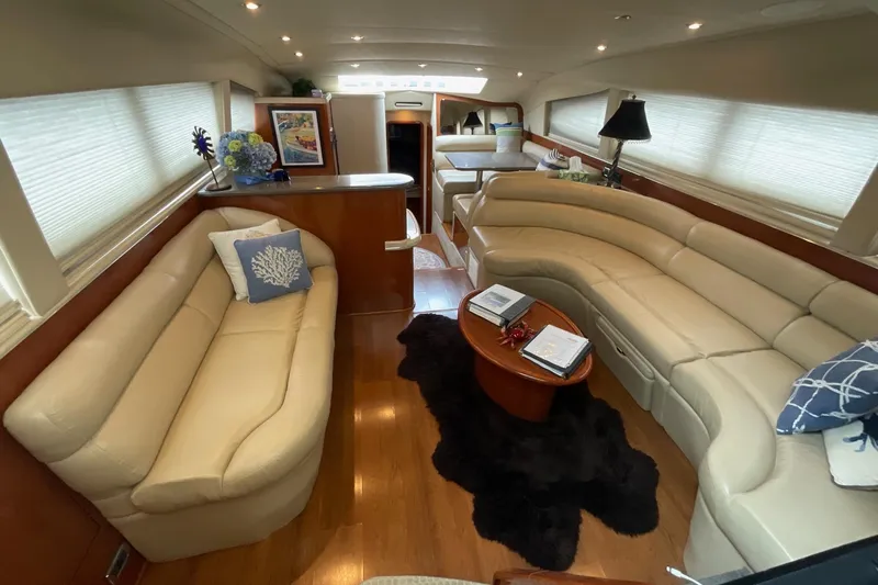 Club Level Yacht Photos Pics Luxurious interior of 2002 Sea Ray 480 Motor Yacht with plush seating and elegant decor.