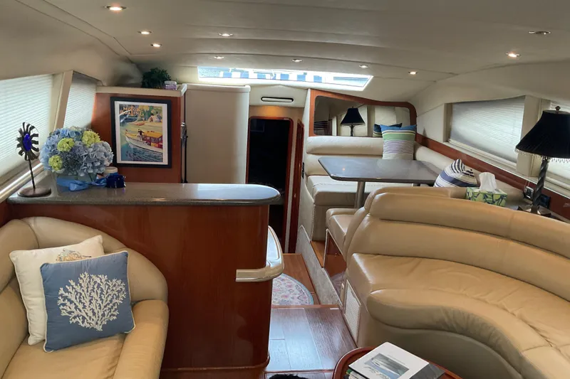 Club Level Yacht Photos Pics Luxurious interior of 2002 Sea Ray 480 Motor Yacht with elegant seating and decor.