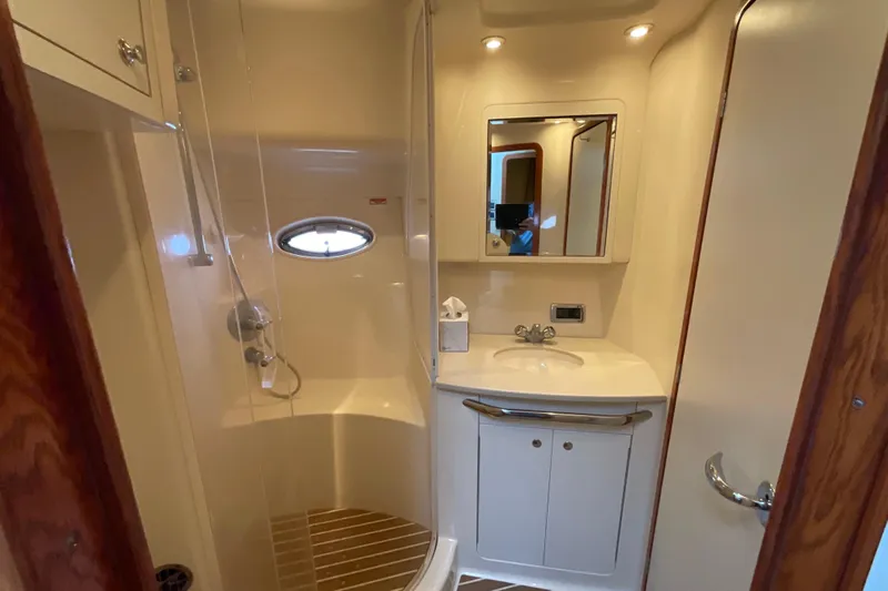 Club Level Yacht Photos Pics Luxurious bathroom in 2002 Sea Ray 480 Motor Yacht with shower and vanity.