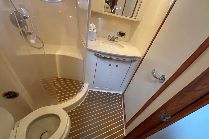 Club Level Yacht Photos Pics Bathroom interior of 2002 Sea Ray 480 Motor Yacht with shower and sink.