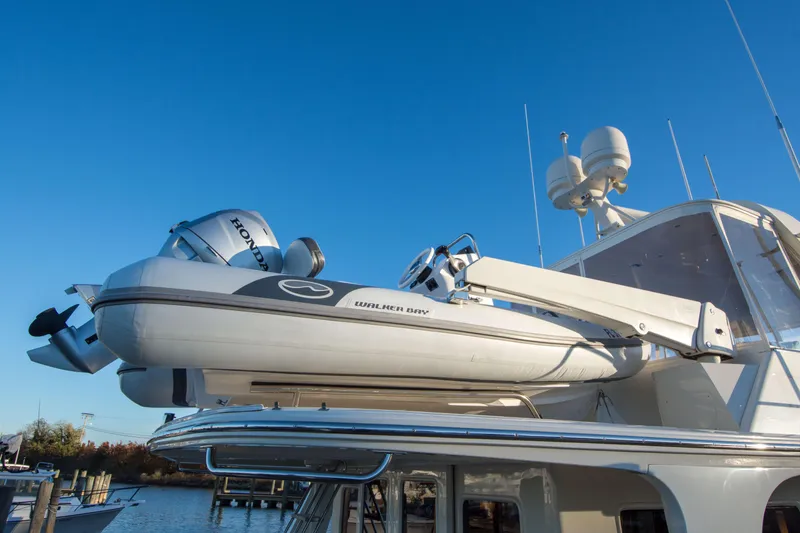  Yacht Photos Pics 2013 Fleming 55 yacht with Walker Bay tender and Honda outboard motor.