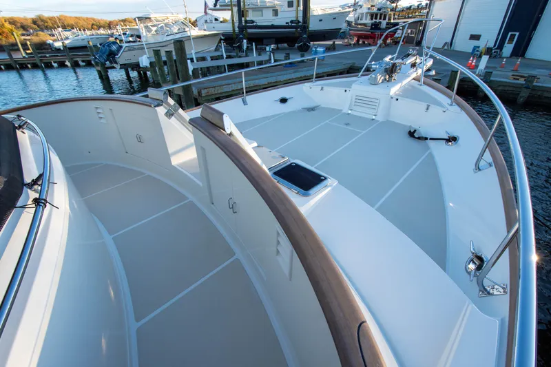  Yacht Photos Pics Bow view of 2013 Fleming 55 yacht docked at marina.