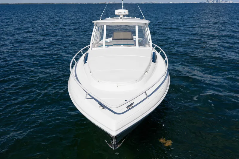  Yacht Photos Pics 2016 Intrepid 400 Cuddy boat on open water, front view.
