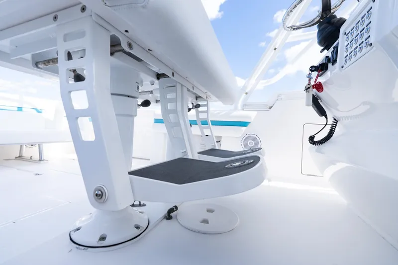  Yacht Photos Pics 2016 Intrepid 400 Cuddy helm station with modern controls and seating.