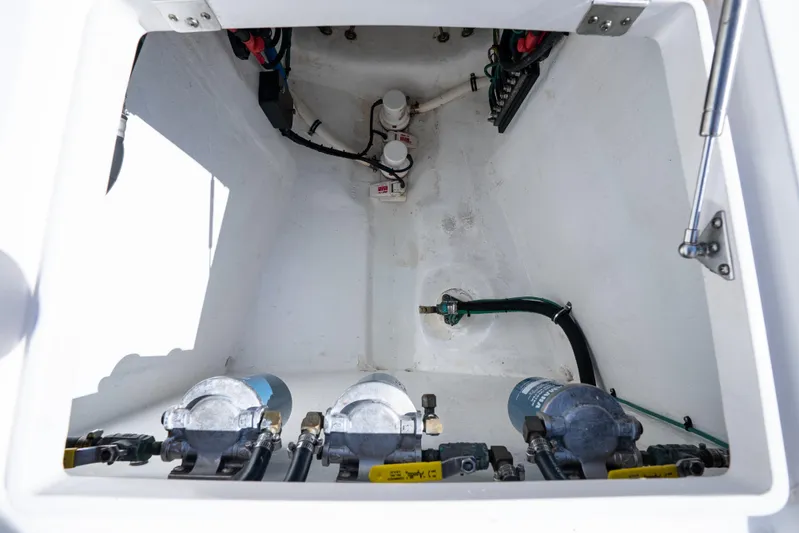  Yacht Photos Pics 2016 Intrepid 400 Cuddy engine compartment with visible pumps and wiring.