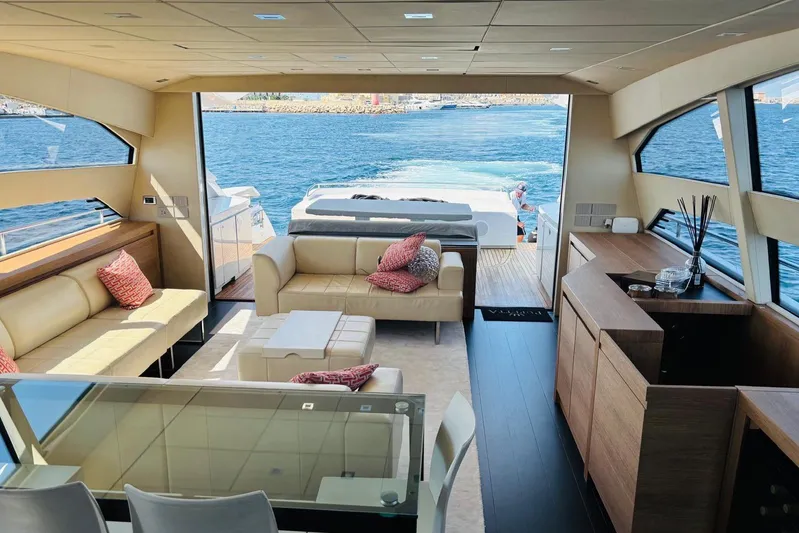  Yacht Photos Pics Luxurious interior of 2009 Pershing 80' yacht with elegant seating and ocean view.