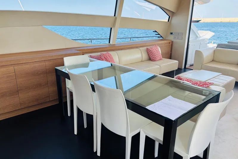  Yacht Photos Pics Luxurious interior of 2009 Pershing 80' yacht with modern dining area and sea view.