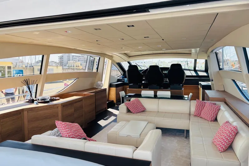  Yacht Photos Pics Luxurious interior of a 2009 Pershing 80' yacht with modern seating and panoramic windows.