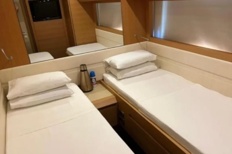 Yacht Photos Pics Luxurious twin cabin interior on 2009 Pershing 80' yacht, featuring modern design and amenities.