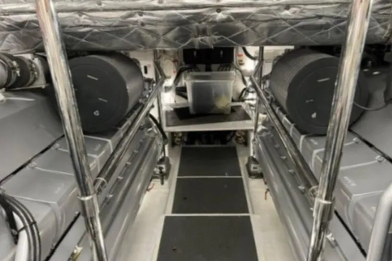  Yacht Photos Pics Engine room of 2009 Pershing 80' yacht with dual engines and metallic components.