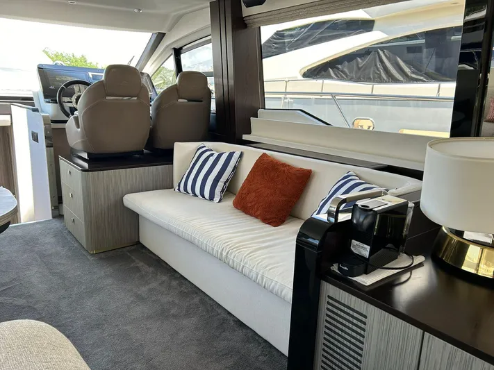 2021 Azimut 55 Fly @vallarta  Yacht Photos Pics Luxurious interior of a 2021 Azimut 55 yacht with modern seating and decor.