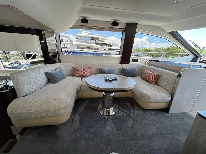 2021 Azimut 55 Fly @vallarta  Yacht Photos Pics Luxurious interior of 2021 Azimut 55 yacht with plush seating and modern decor.