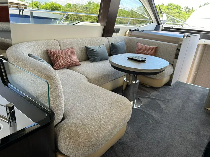 2021 Azimut 55 Fly @vallarta  Yacht Photos Pics Luxurious interior of 2021 Azimut 55 yacht with plush seating and modern decor.