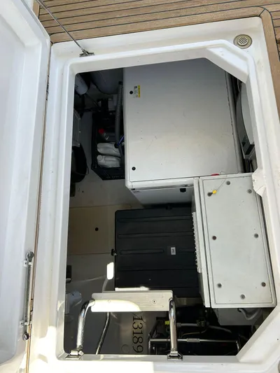 2021 Azimut 55 Fly @vallarta  Yacht Photos Pics Engine compartment of a 2021 Azimut 55 yacht, showcasing mechanical components.