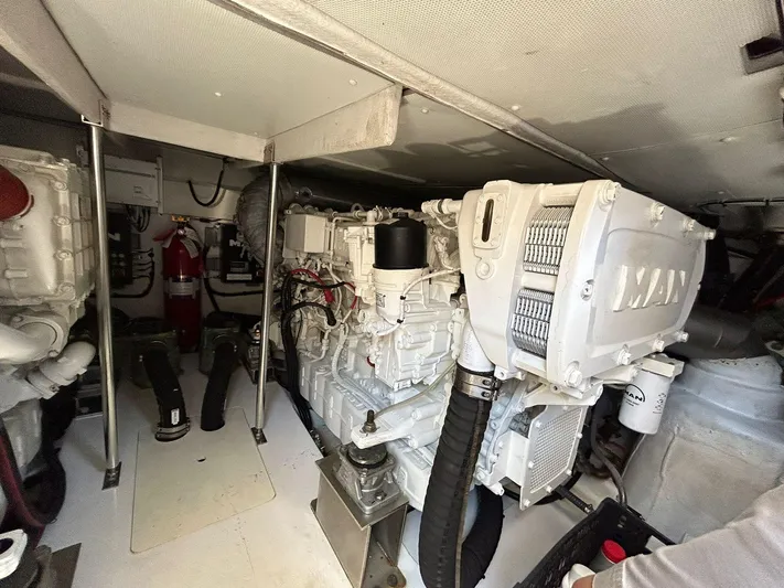 2021 Azimut 55 Fly @vallarta  Yacht Photos Pics Engine room of a 2021 Azimut 55 yacht featuring a MAN engine.
