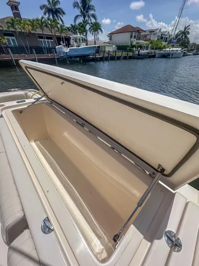  Yacht Photos Pics Open storage compartment on a 2010 Grady-White Canyon 336 boat by the waterfront.