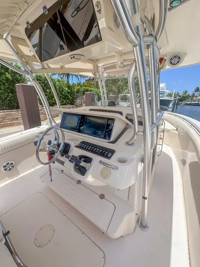  Yacht Photos Pics 2010 Grady-White Canyon 336 boat helm with modern controls and dual screens.