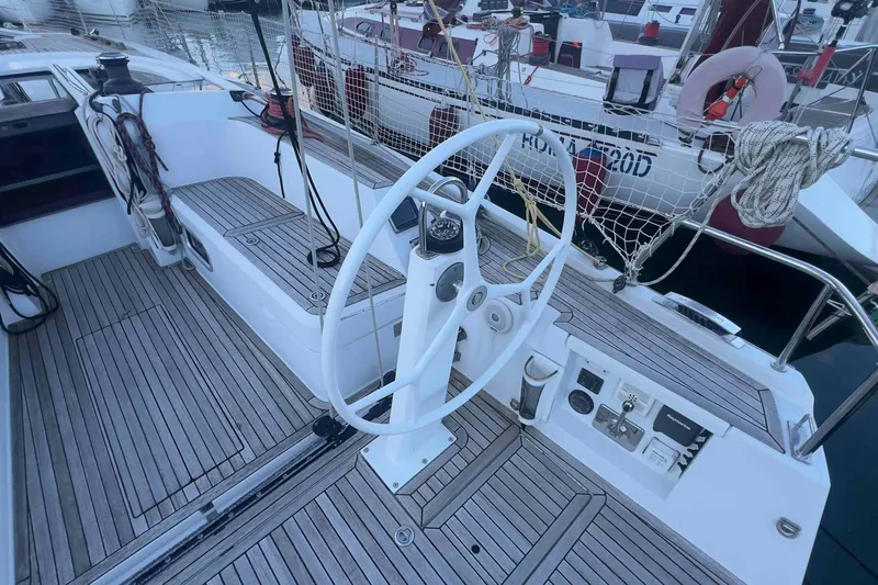  Yacht Photos Pics 2015 Grand Soleil 39 Maletto sailboat cockpit with steering wheel and teak decking.