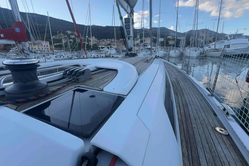  Yacht Photos Pics Sailing yacht Grand Soleil 39 Maletto 2015 docked in a scenic marina.