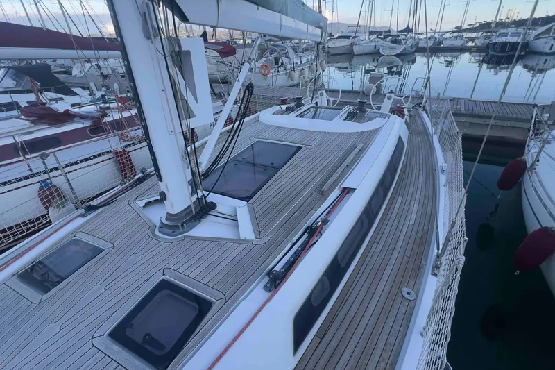  Yacht Photos Pics 2015 Grand Soleil 39 Maletto sailboat docked in marina, showcasing sleek deck design.
