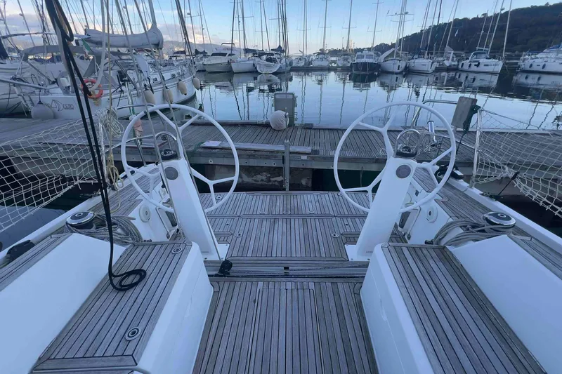  Yacht Photos Pics Grand Soleil 39 Maletto 2015 yacht with dual steering wheels docked at marina.