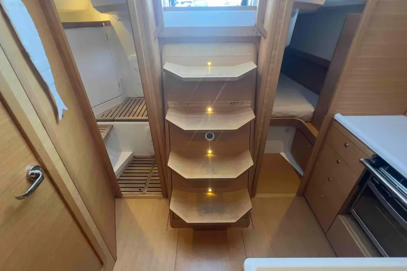  Yacht Photos Pics Interior of 2015 Grand Soleil 39 Maletto yacht with wooden cabinetry and modern design.