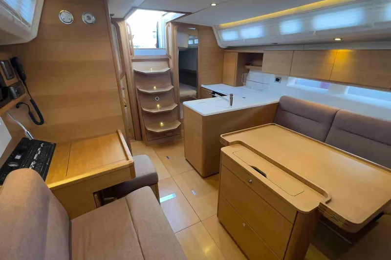  Yacht Photos Pics Luxurious interior of 2015 Grand Soleil 39 Maletto yacht with modern wood finish.