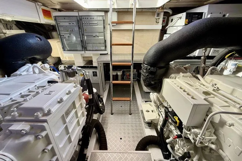 M/y La Seduction Yacht Photos Pics Engine room of a 2022 Ferretti Yachts 550, featuring dual engines and control panels.