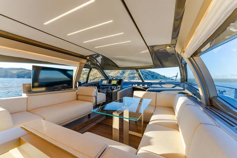 M/y La Seduction Yacht Photos Pics Luxurious interior of 2022 Ferretti Yachts 550 with panoramic windows and modern furnishings.