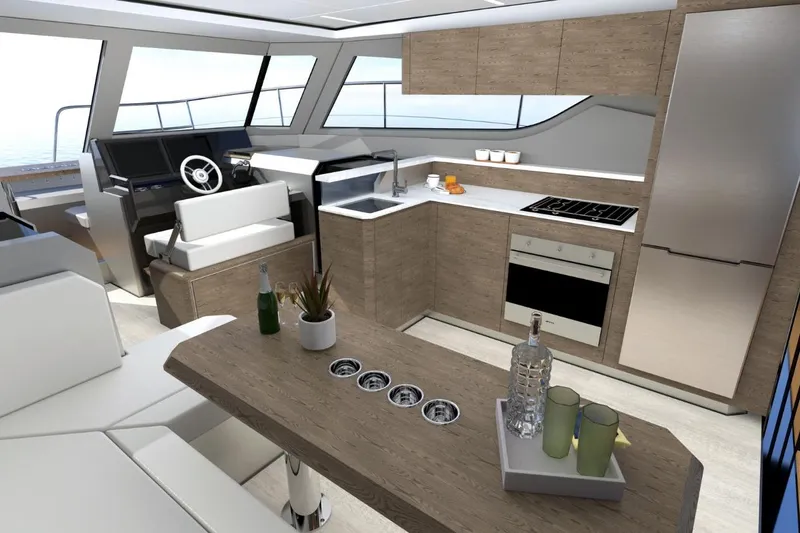  Yacht Photos Pics Luxurious interior of 2026 Aventura 38 Motor Yacht with modern kitchen and helm station.