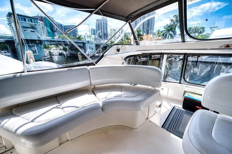 Turn The Paige Yacht Photos Pics Interior of a 2003 Silverton 43 Motor Yacht with city view.