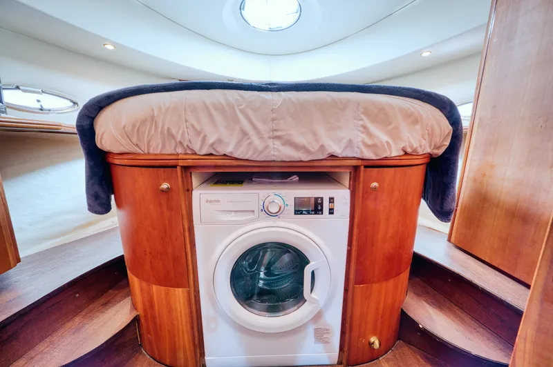 Turn The Paige Yacht Photos Pics Interior of 2003 Silverton 43 Motor Yacht with washing machine.