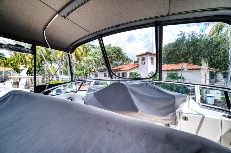 Turn The Paige Yacht Photos Pics Interior of a 2003 Silverton 43 Motor Yacht with marina view.