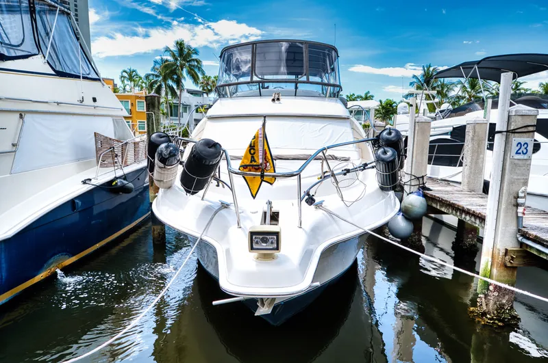 Turn The Paige Yacht Photos Pics 2003 Silverton 43 Motor Yacht docked at marina.