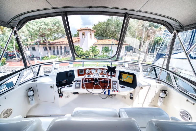 Turn The Paige Yacht Photos Pics Interior view of 2003 Silverton 43 Motor Yacht helm with navigation system.