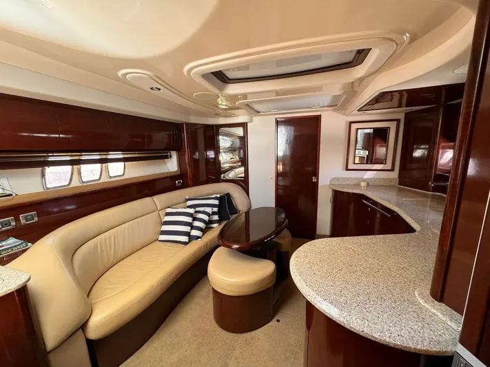 The Boardroom Yacht Photos Pics Luxurious interior of 2008 Sea Ray Sundancer yacht with elegant seating and modern design.
