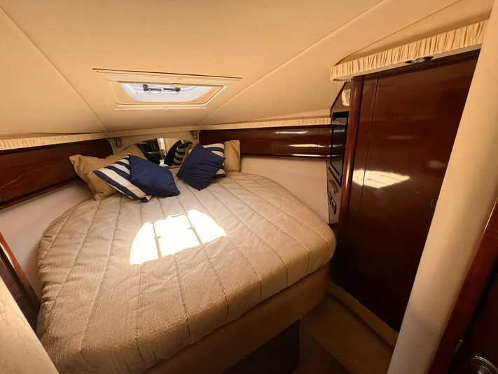 The Boardroom Yacht Photos Pics Luxurious cabin interior of 2008 Sea Ray Sundancer yacht with cozy bedding.